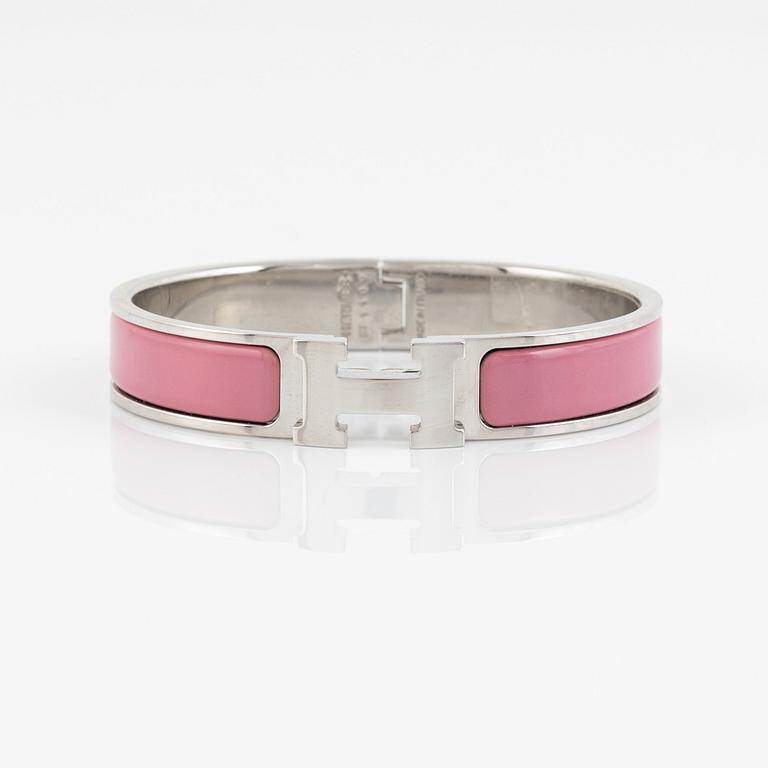 Hermès, a 'Clic H' bracelet.