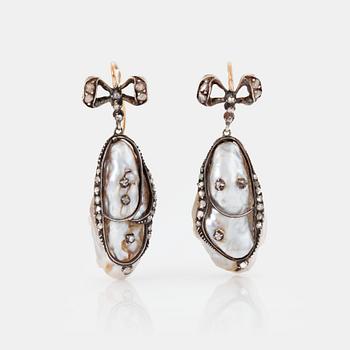 842. A PAIR OF EARRINGS set with baroque-shaped pearls and rose-cut diamonds.