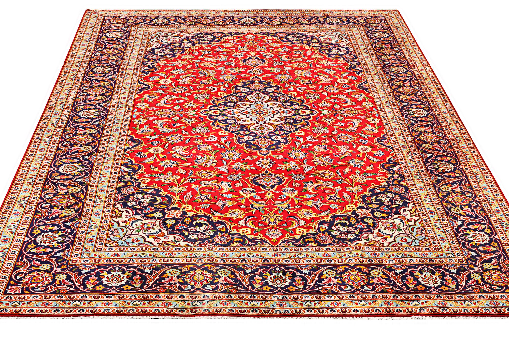 A Kashan carpet, a. 360 x 243 cm.