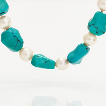 A cultured pearl and turquoise necklace.