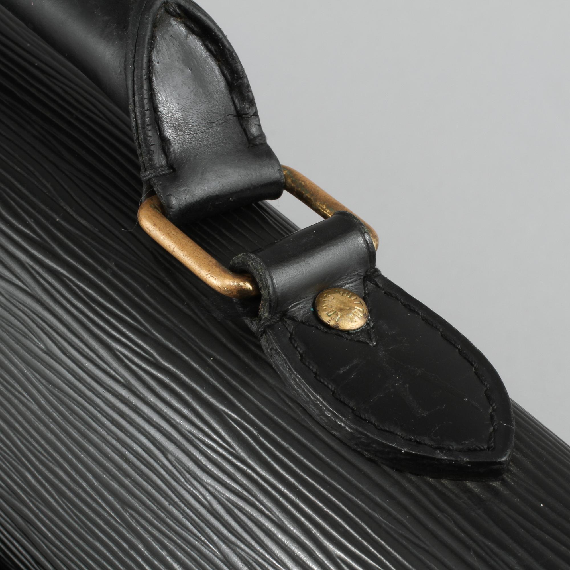 PORTFÖLJ, "Serviette conseiller ambassadeure Epi", Louis Vuitton.