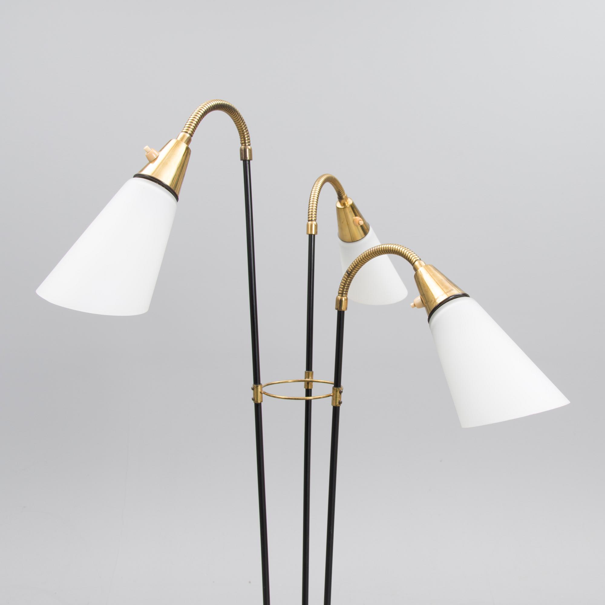 A mid 20th century floor lamp, marked AJH.7.