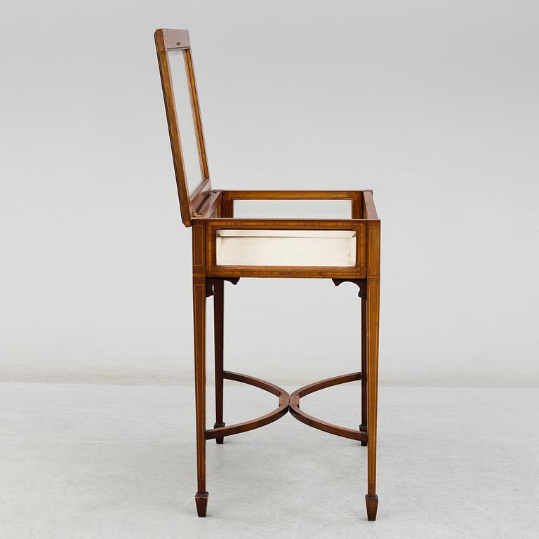 An early 20th century display table.