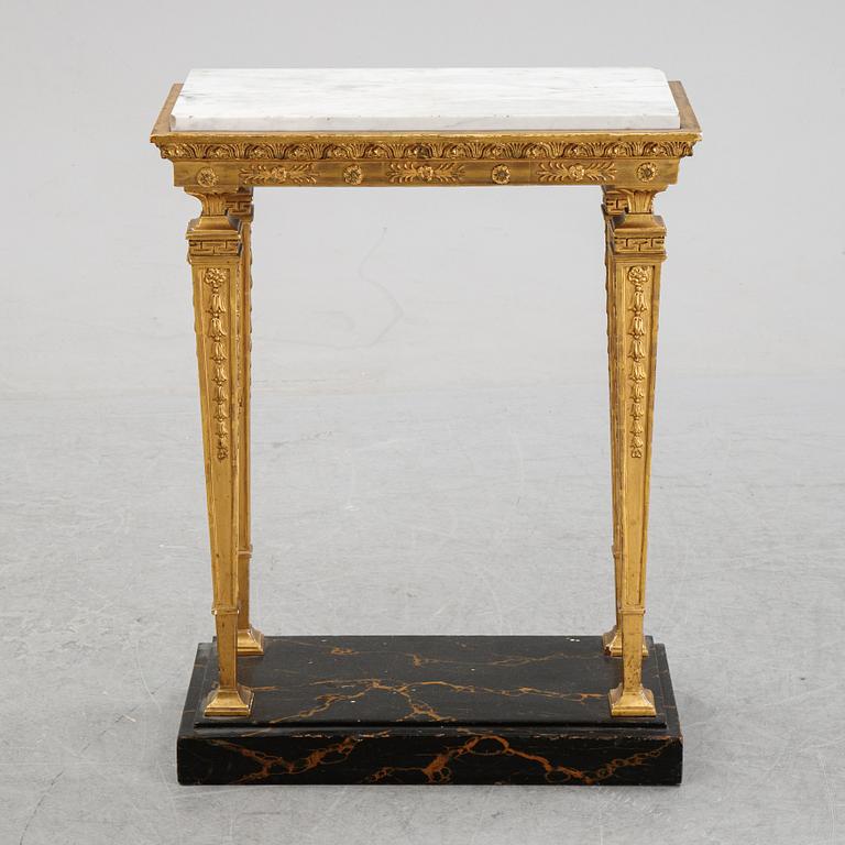An early 19th Century console table.