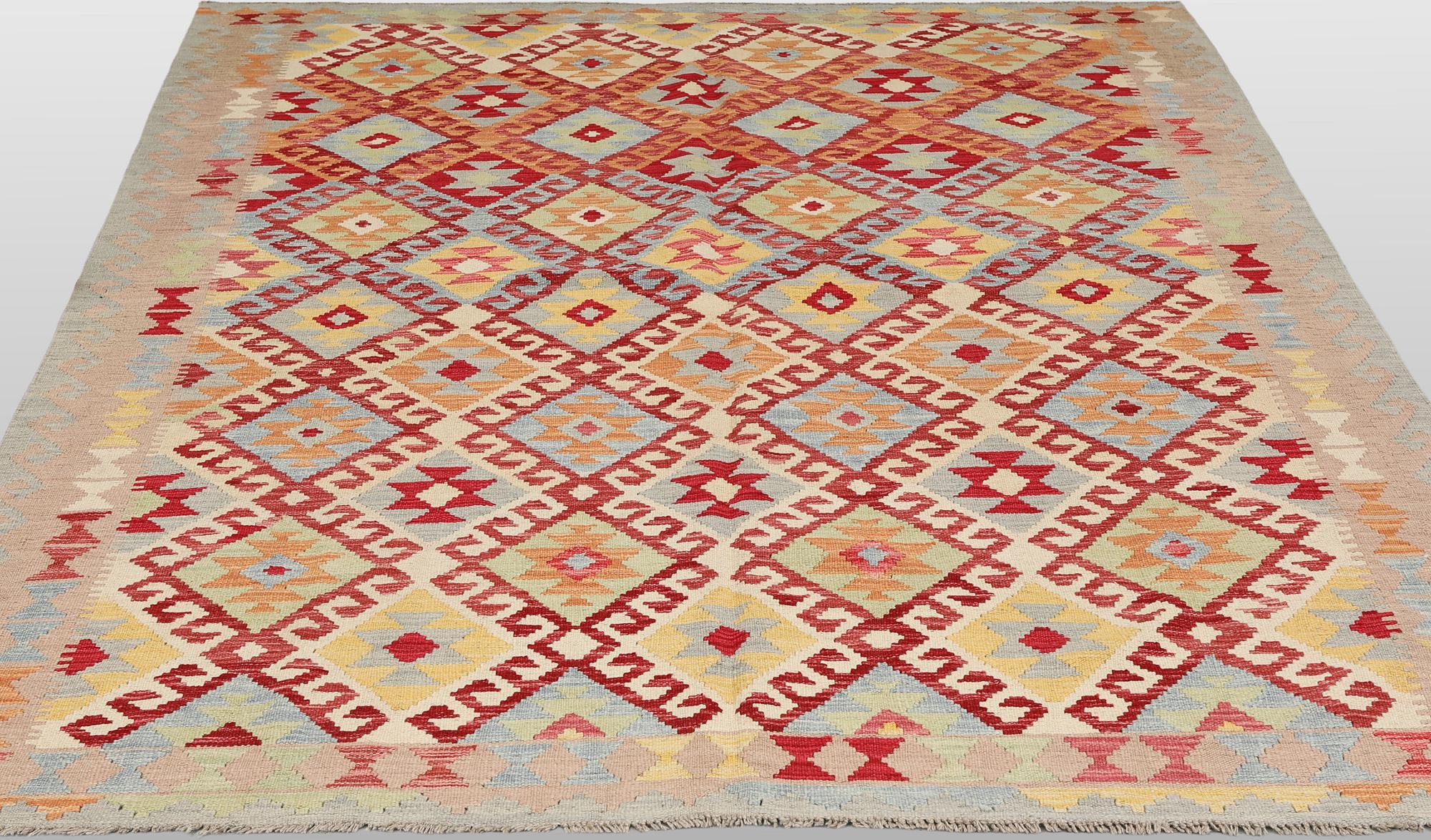 A Kilim rug, approx. 251 x 189 cm.