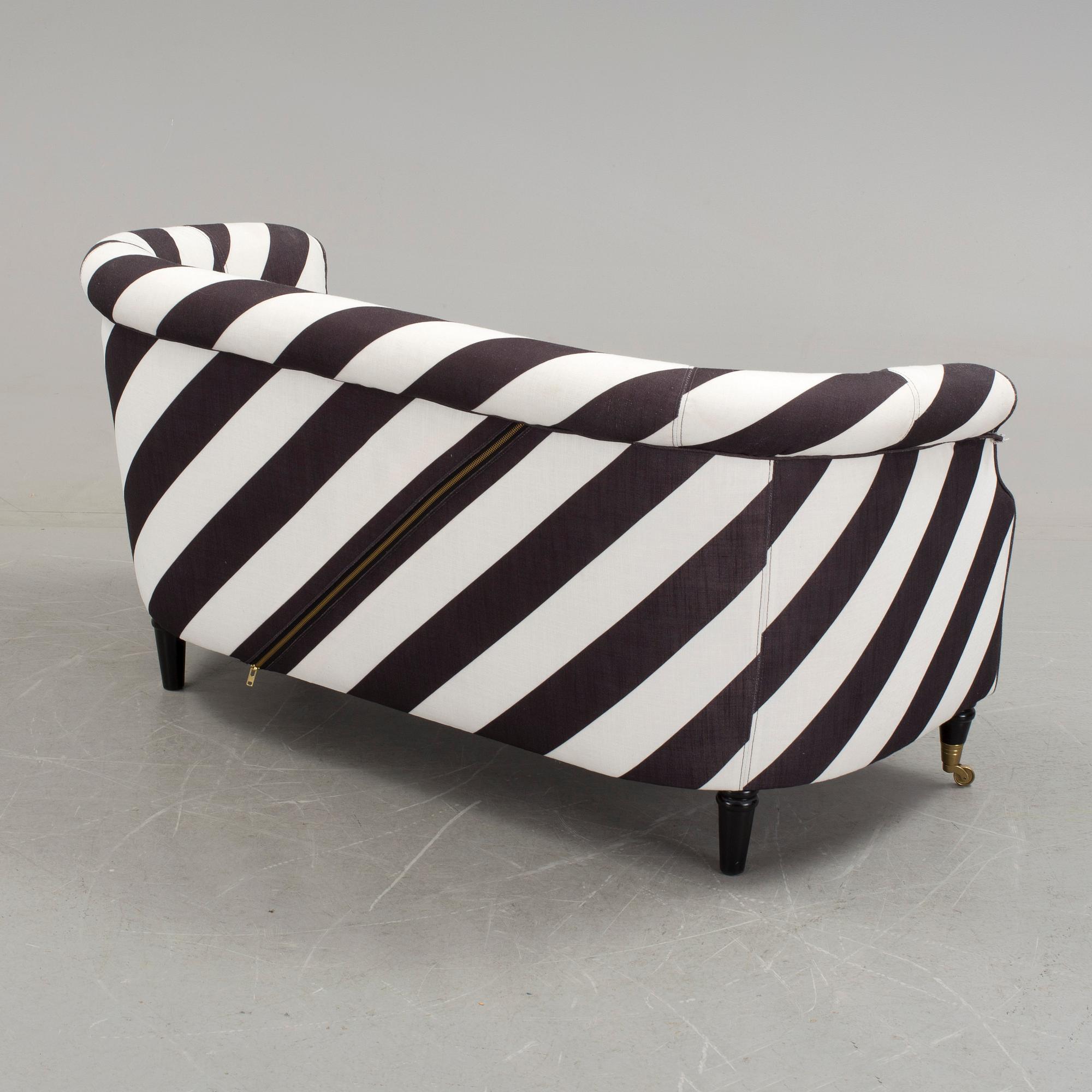 A black and white striped sofa by Rosenhof Art Factory, 21st century.