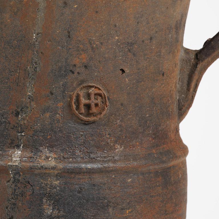 A cast-iron garden urn from Hellefors styckebruk, dated 1791.