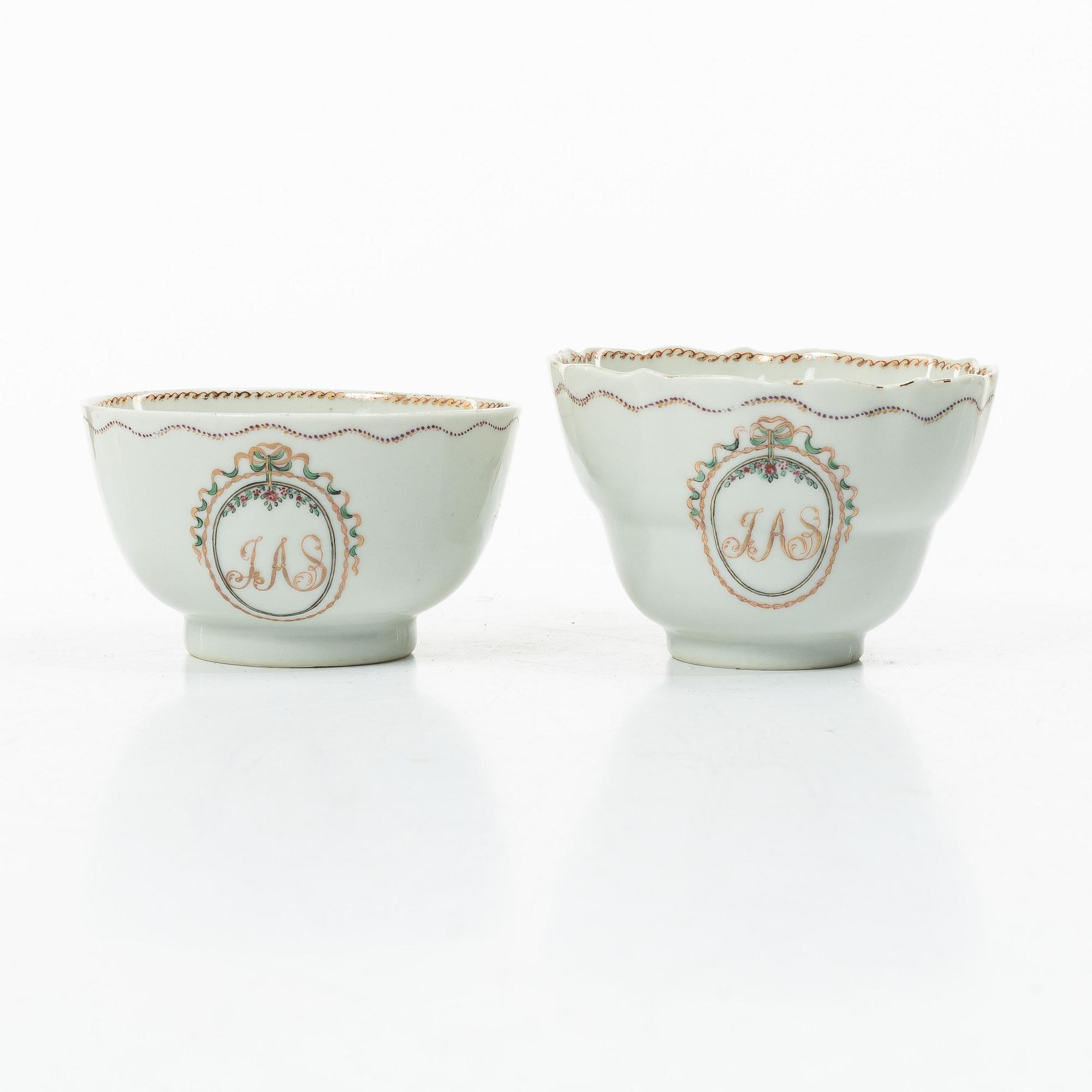Cups and saucers, 11+7, and a teapot in famille rose with monogram, company porcelain, China, 18th century.