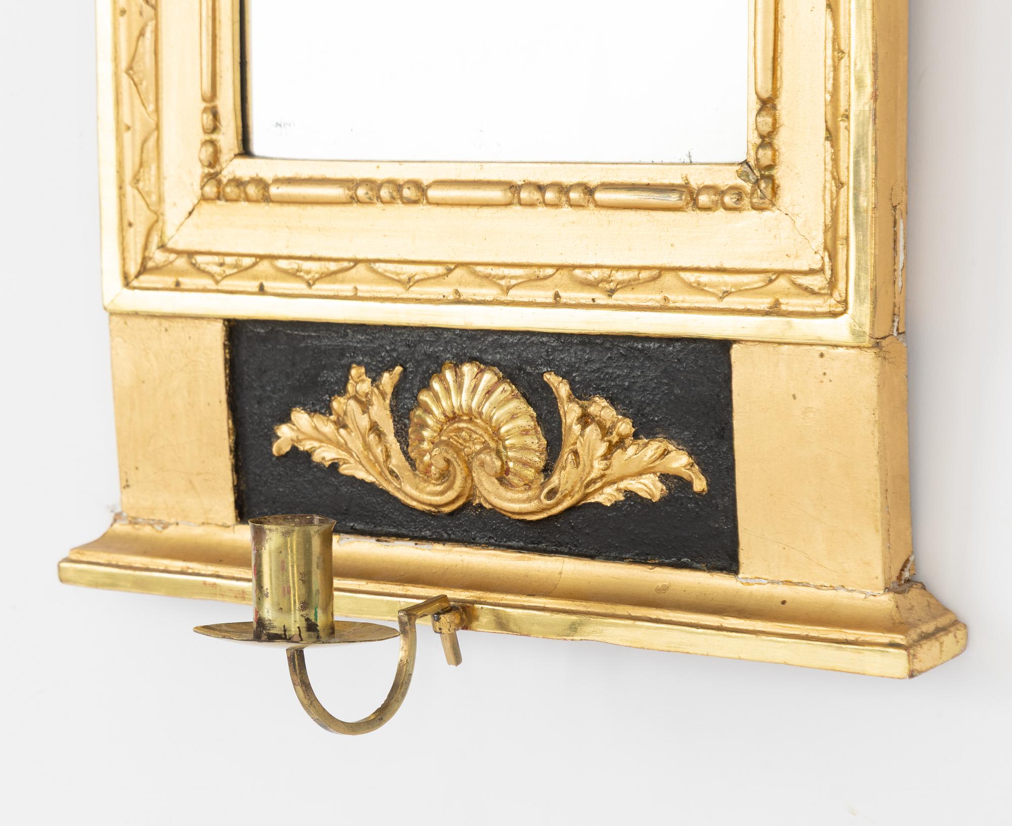 A mirror wall sconce, late Gustavian, early 19th Century.