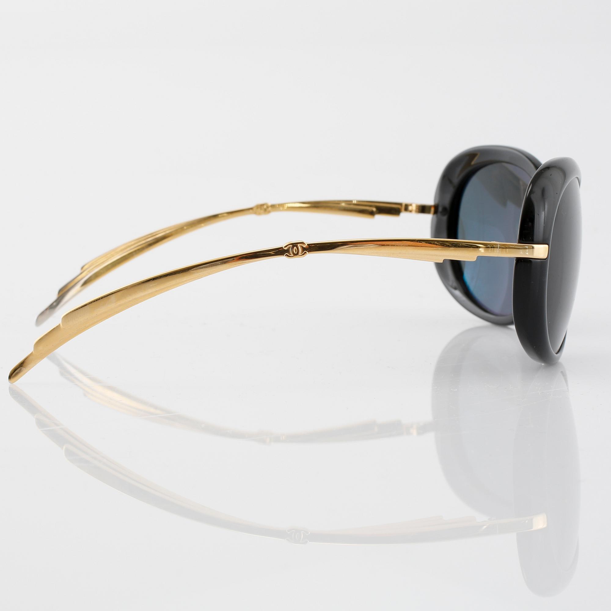 SOLGLASÖGON, Chanel.