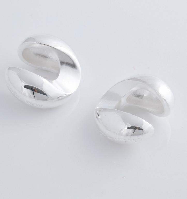 A pair of cufflink, by Ole Lynggaard.