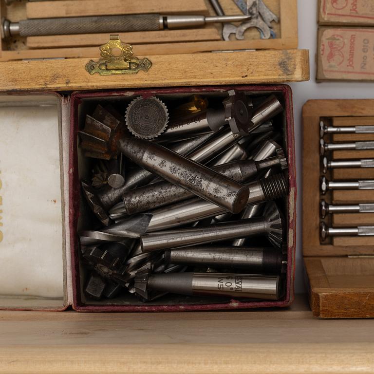 Watchmaking tools and spare parts, including a lathe by Lorch.
