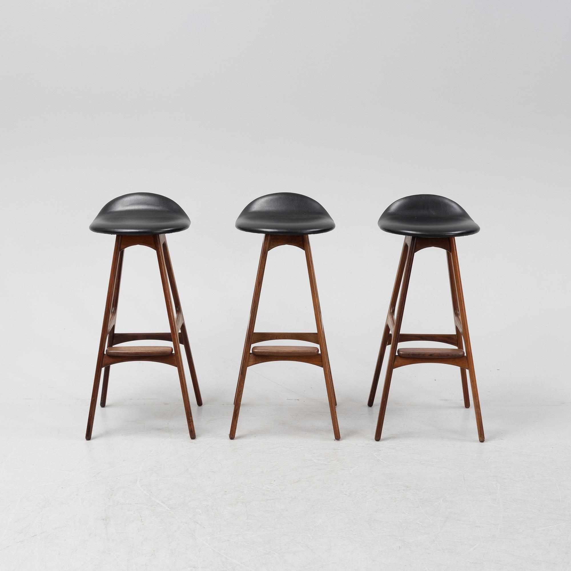 Erik Buch, three model 'OD61' rosewood bar stools from Odense Maskinsnedkeri A-S, Denmark, 1960's.
