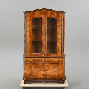 A 20th Century rococo style vitrine cabinet.