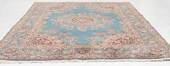 A Kirman carpet, c. 335 x 232 cm.