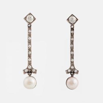 A pair of 18K gold and cultured halfpearl and diamond earrings.