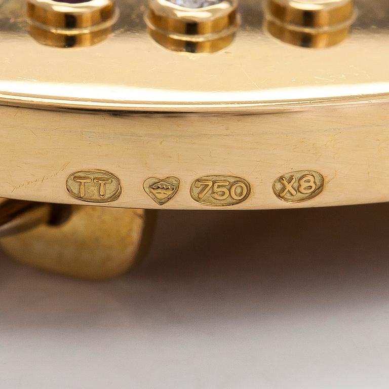 Torbjörn Tillander, an 18K gold brooch, with brilliant-cut diamonds, rubies and cultured pearls. Helsinki 1983.