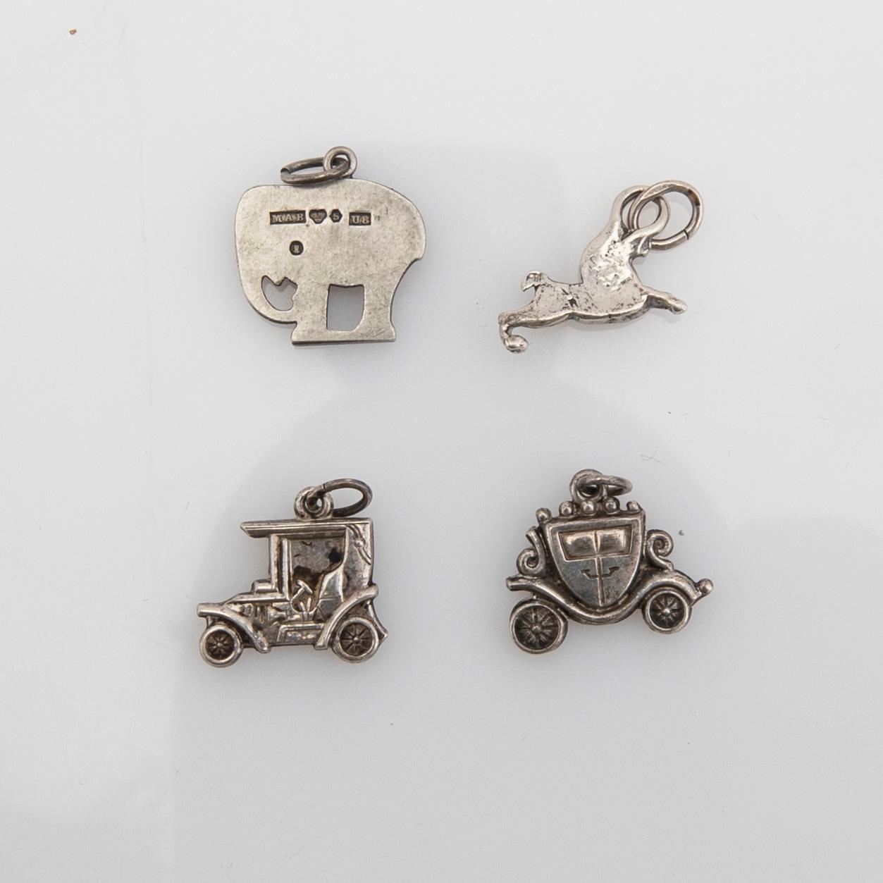 Bordsdekorationer och berlocker, silver, 9 delar.