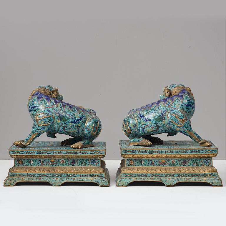 A large pair of cloisonné temple lions, Qing dynasty, 19th Century.