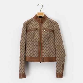 Gucci, a GG supreme jacket and shorts, size 38, 2000.