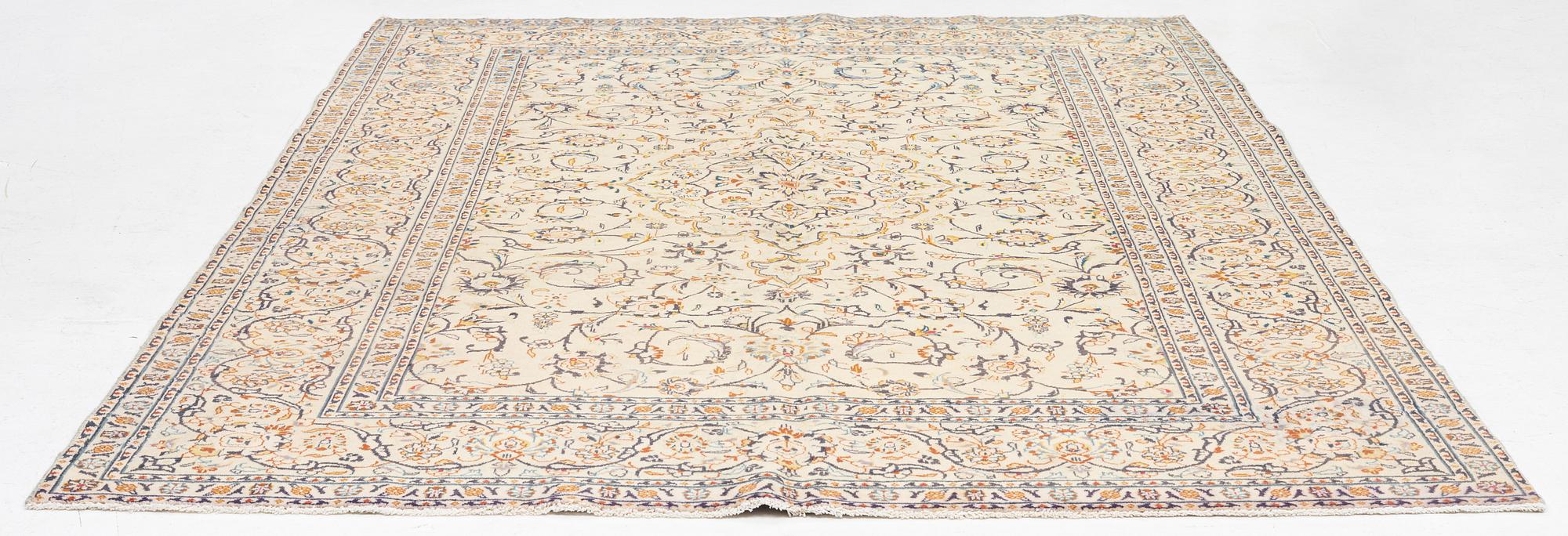 A carpet, Keshan, c. 306 x 214 cm.