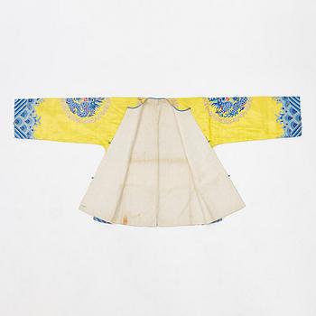 A yellow-ground embroidered silk robe, 20th century.