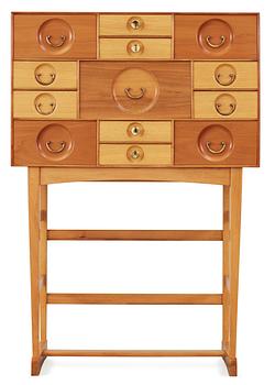 436. A Josef Frank cabinet on stand with thirteen different size  drawers,