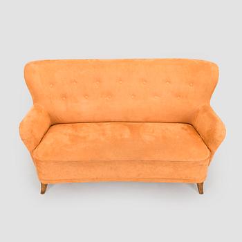 A mid-20th century sofa.