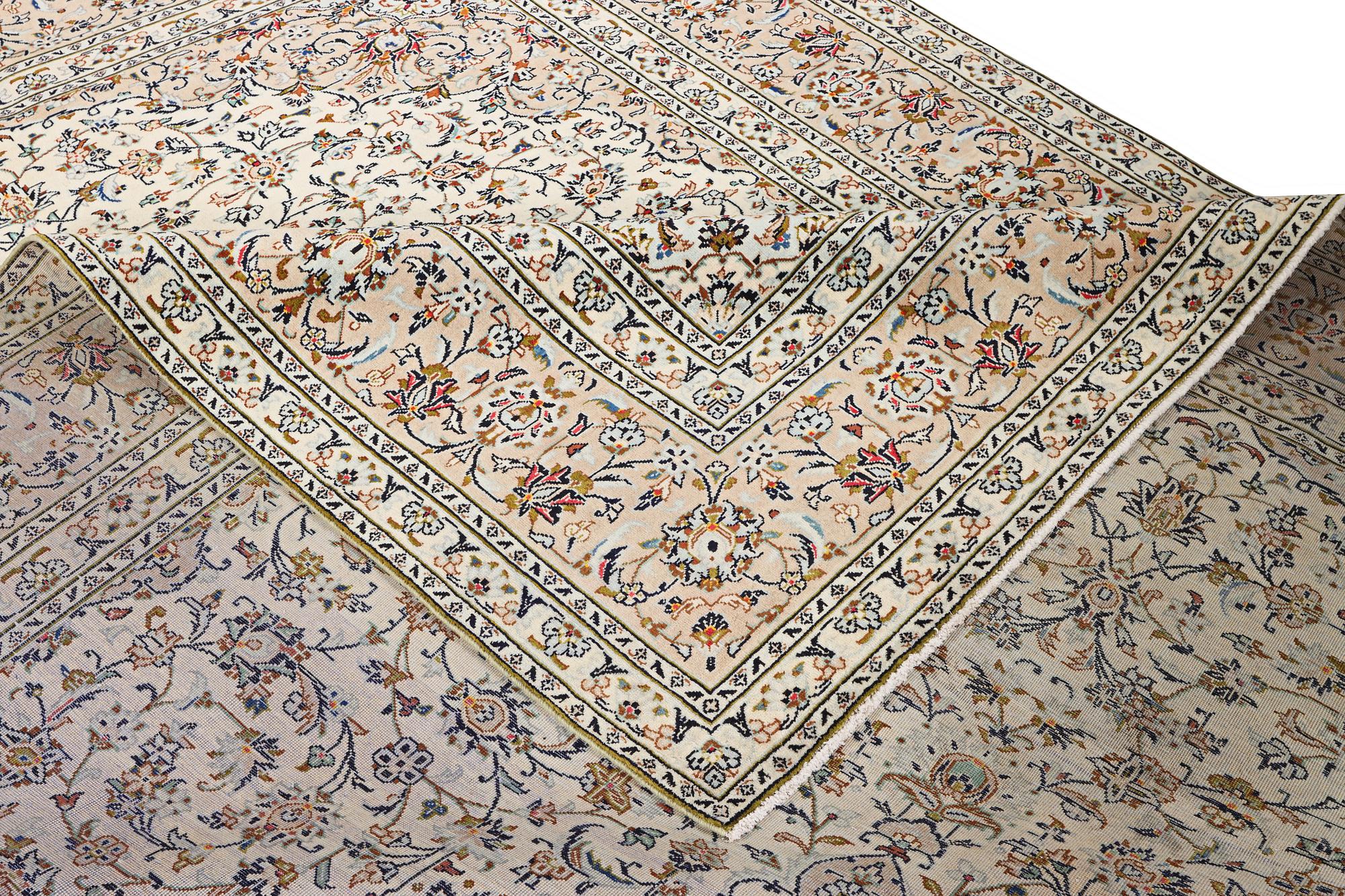 A Kashan carpet, c. 403 x 300 cm.