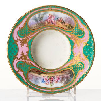 A French 'Sèvres' cup and tremleuse saucer, 19th Century.