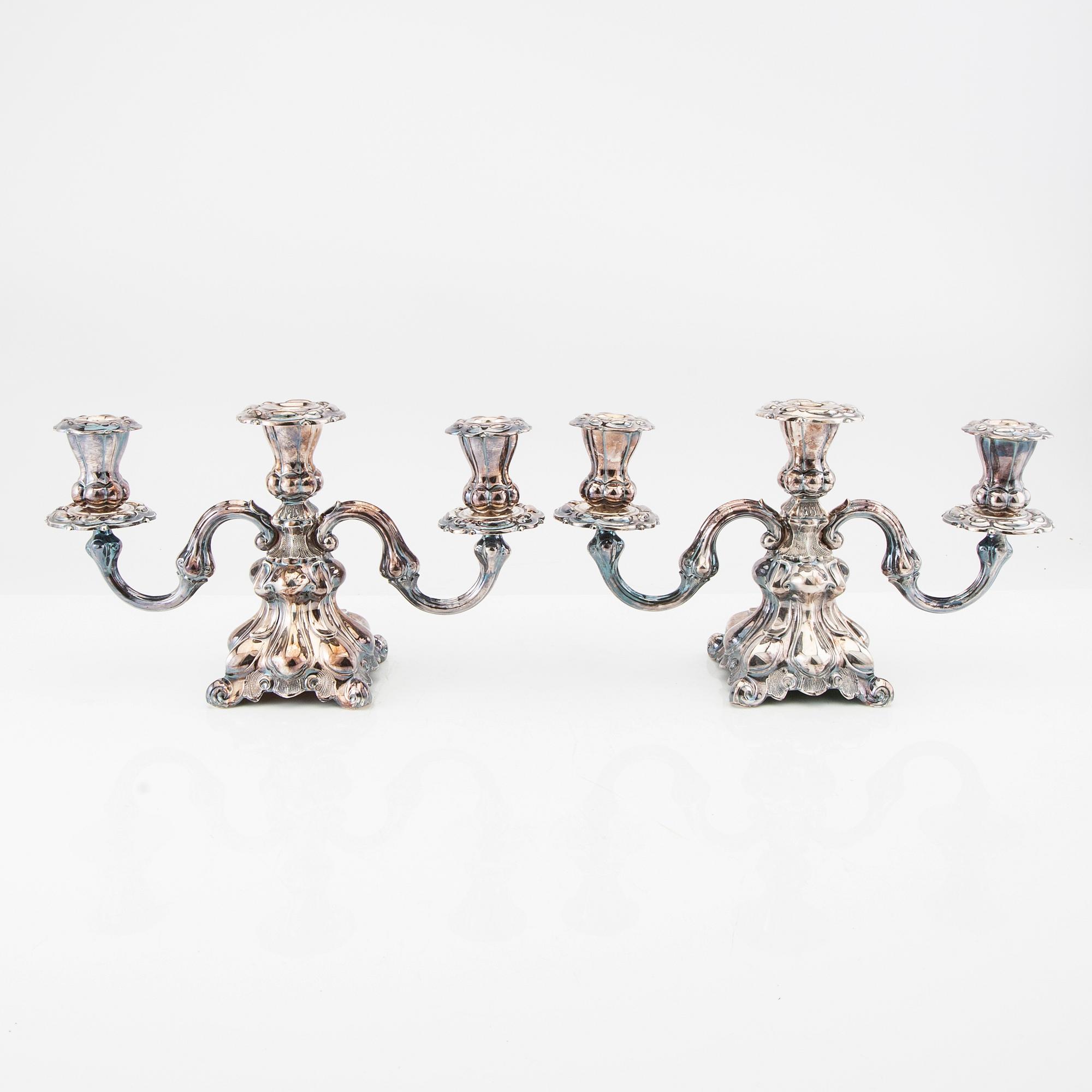 Kandelabrar ett par silver svenska importstämplar rokoko-stil.