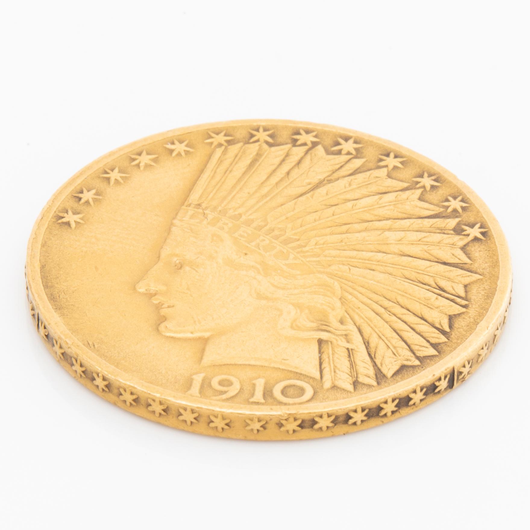 A 10 dollars Indian Head gold coin from 1910.
