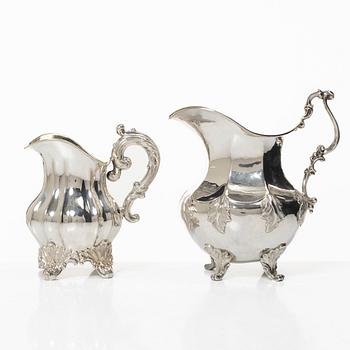Nyrokoko, 1820, Two Swedish silver cream jugs, Stockholm 1850s.