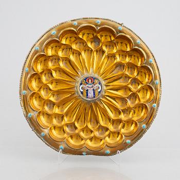 A large gilded brass dish, with enamel decoration, 19th Century.