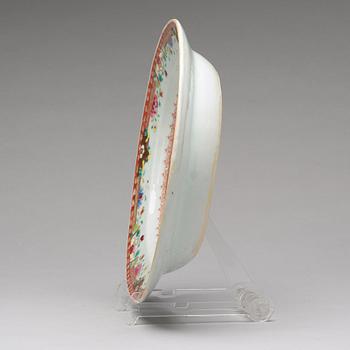 A famille rose 'double peacock' serving dish, Qing dynasty, Qianlong (1736-95).