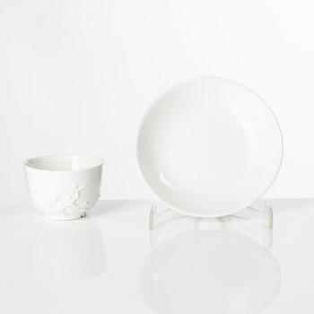 A blanc de Chine cup with saucer, Meissen, 18th century.
