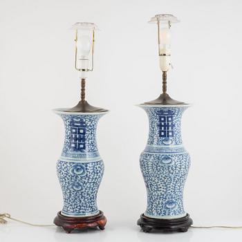 A pair of Chinese porcelain table lamps, early 20th Century.