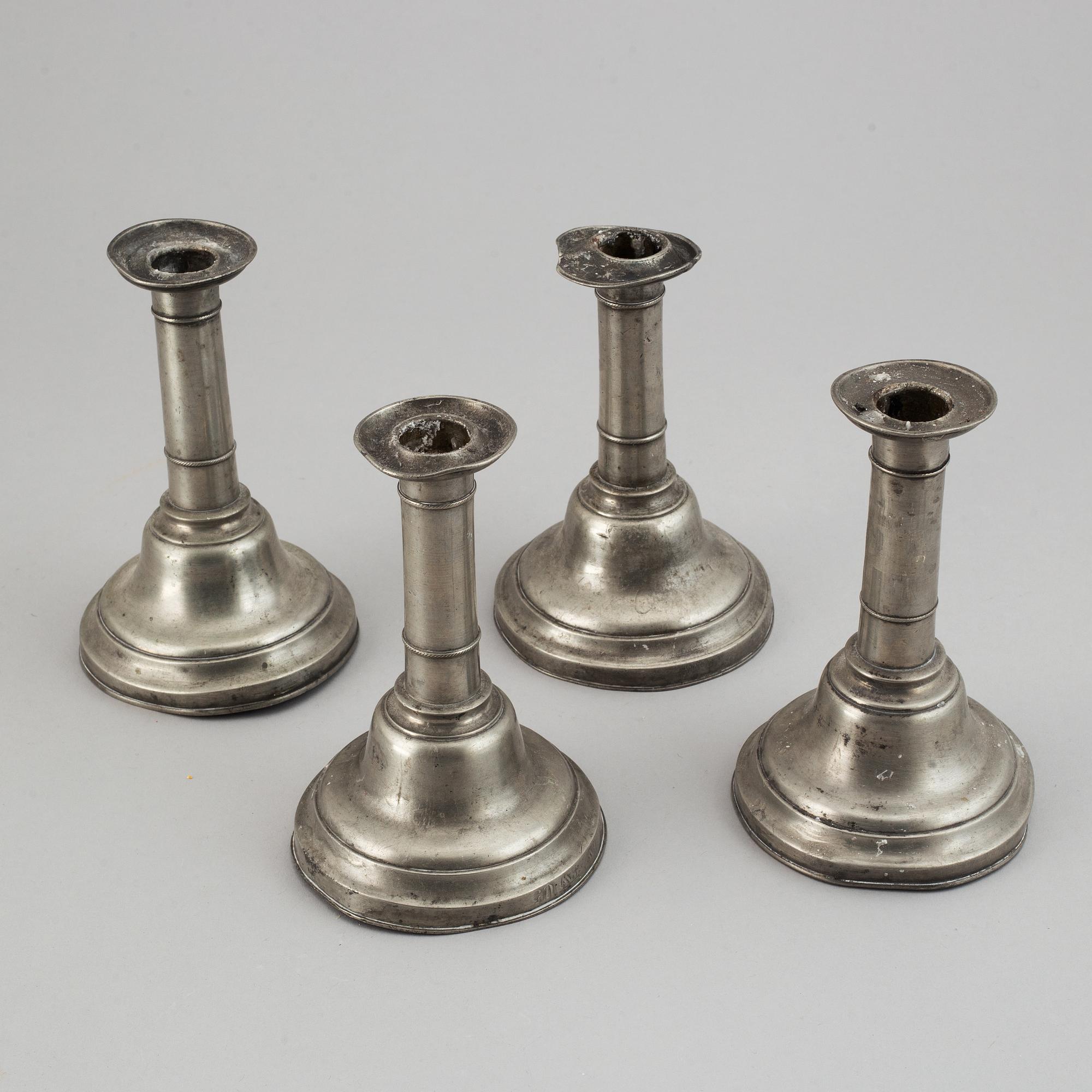 A set of 4 pewter candle sticks, Lund, 19th Century.