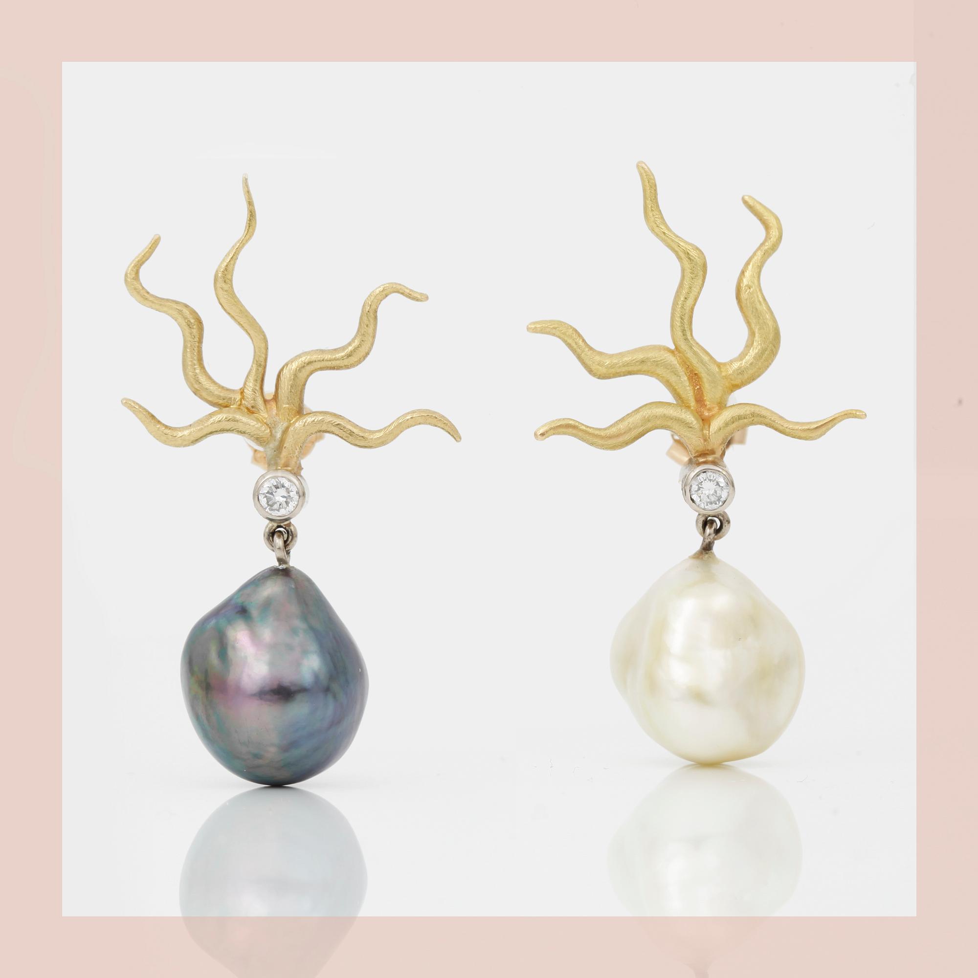 EARRINGS, a pair, 2 diamonds circa .20 ct, 2 cultivated pearls, Kristian Nilsson.