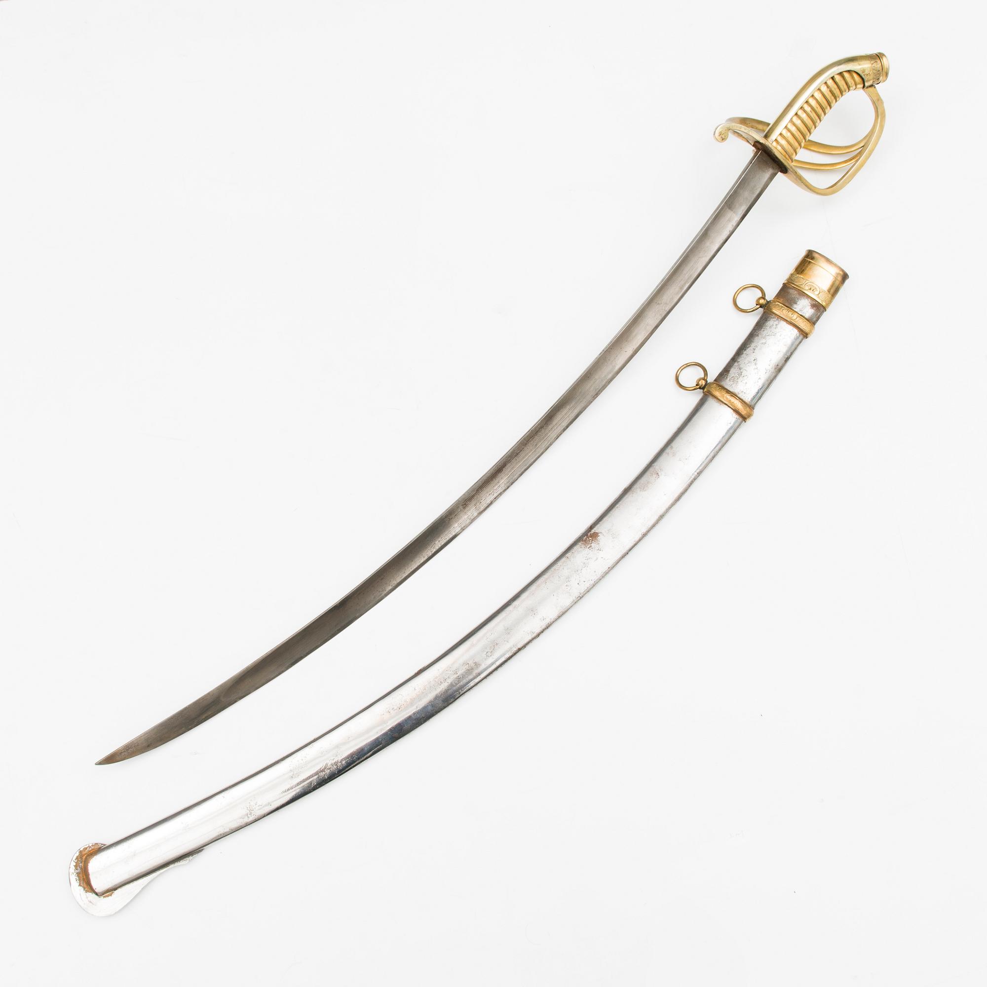 An Imperial Russian model 1827 cavalry award gold sabre.