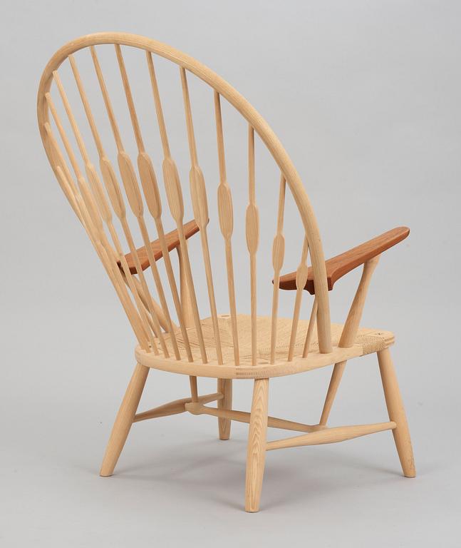 A Hans J Wegner ash and teak 'Peacock chair', by PP Møbler, Denmark.