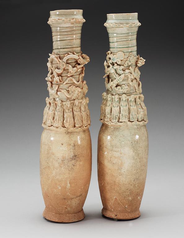 A set of two green glazed vases with covers, Yuan dynasty (1271-1368).