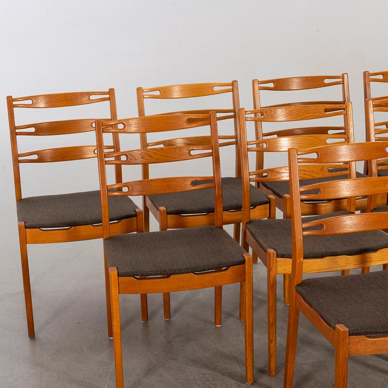 Eight 1960's oak chairs.