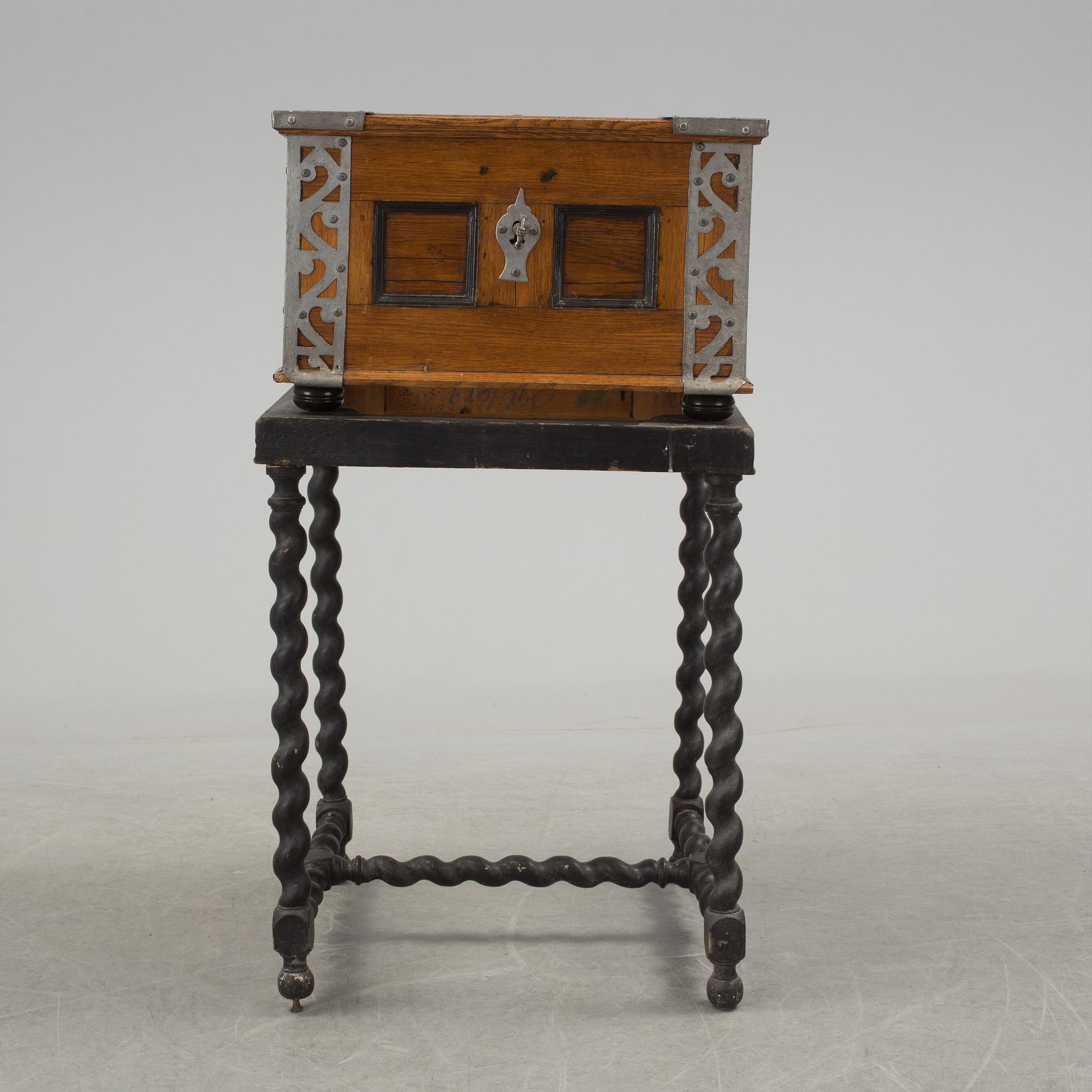 A baroque case on later stand.