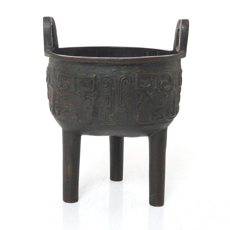 A Chinese tripod bronze censer, Ming style, Qing dynasty (1644-1912).