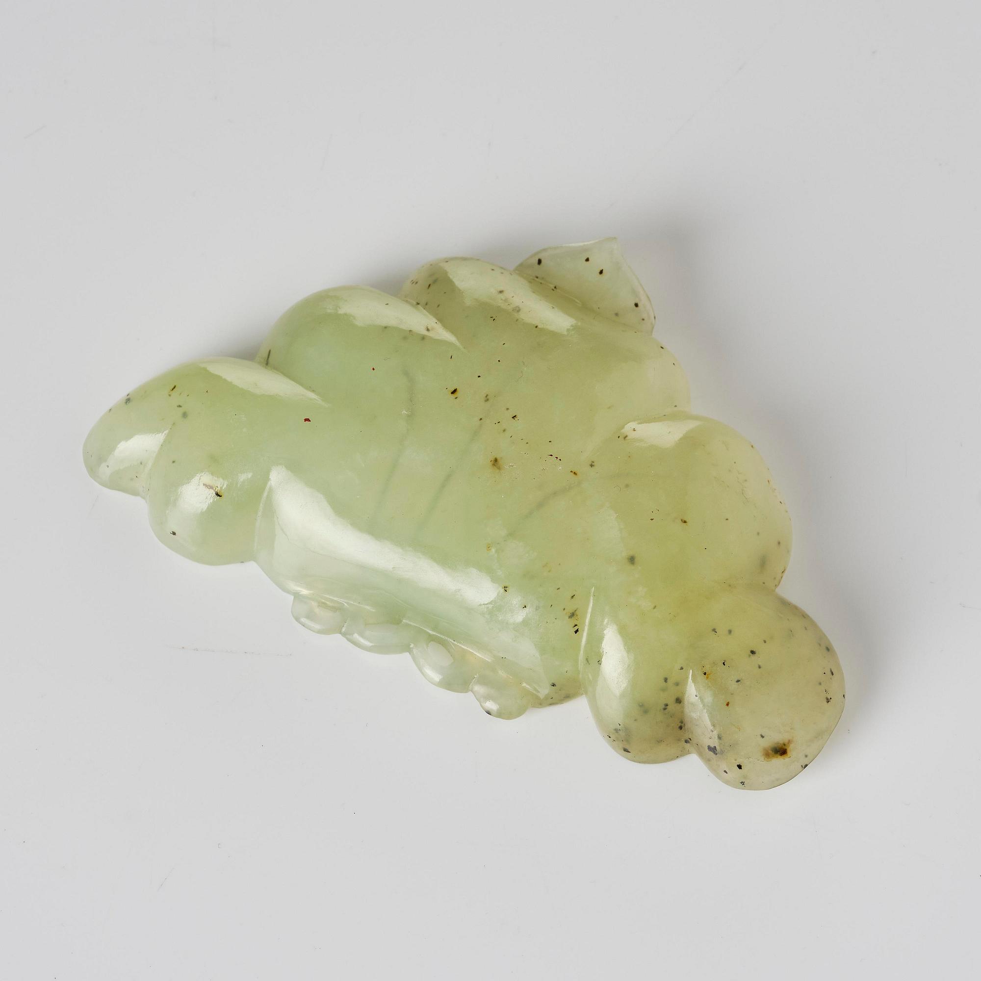 A carved nephrite ink palette, Qing dynasty.