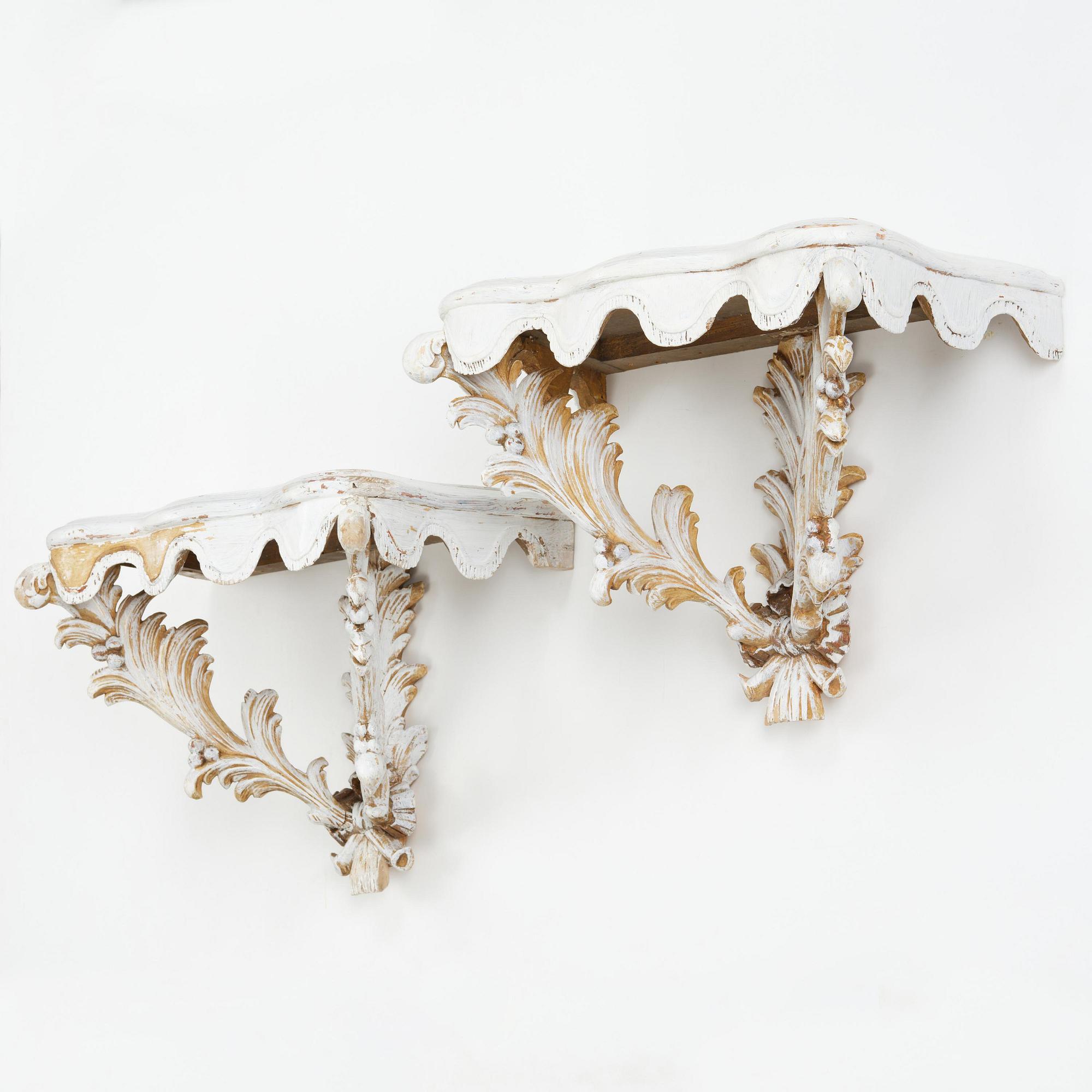 A pair of French Louis XVI-style consoles, late 19th century.