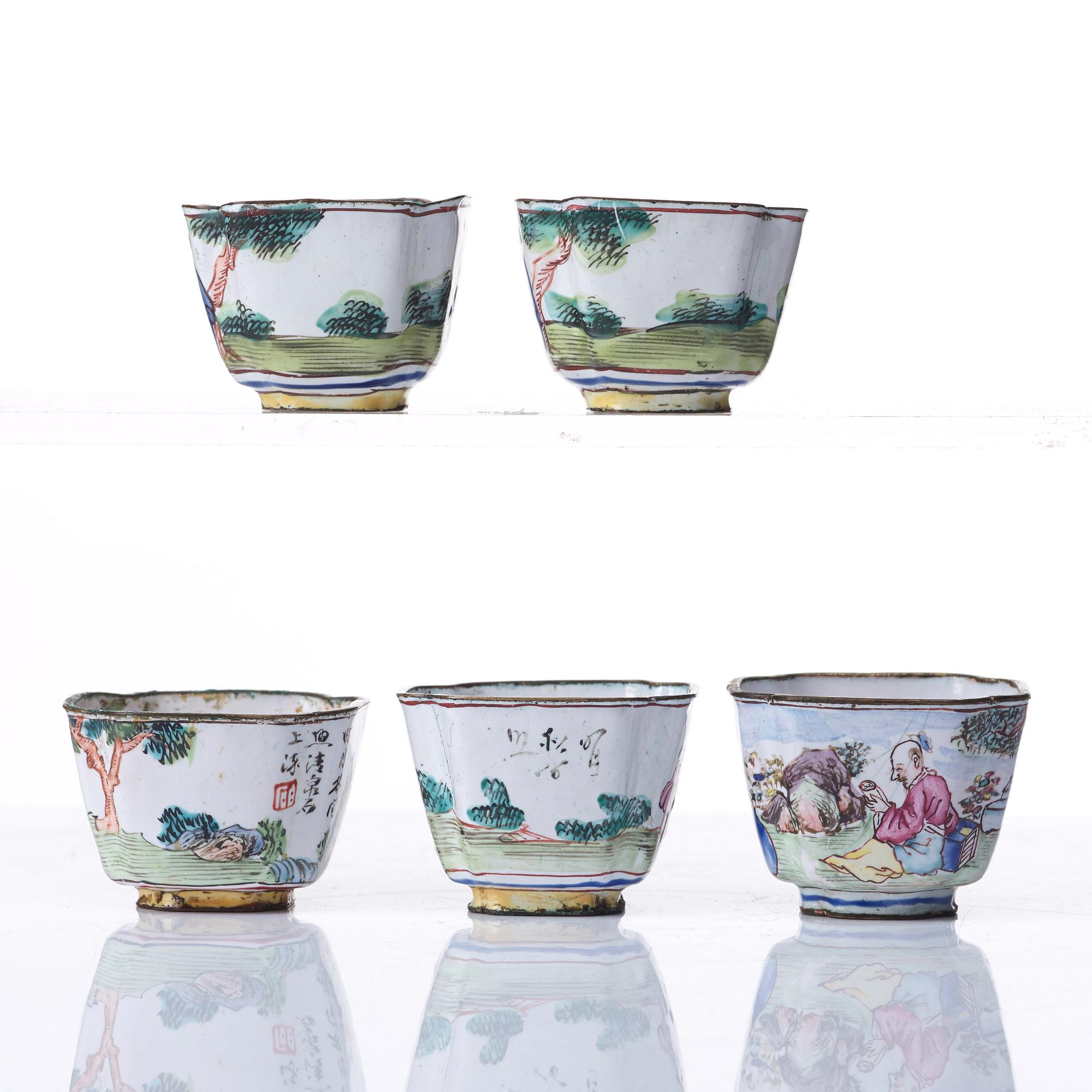 A set of five enamel on copper tea cups and a dish, Qing dynasty, circa 1800.