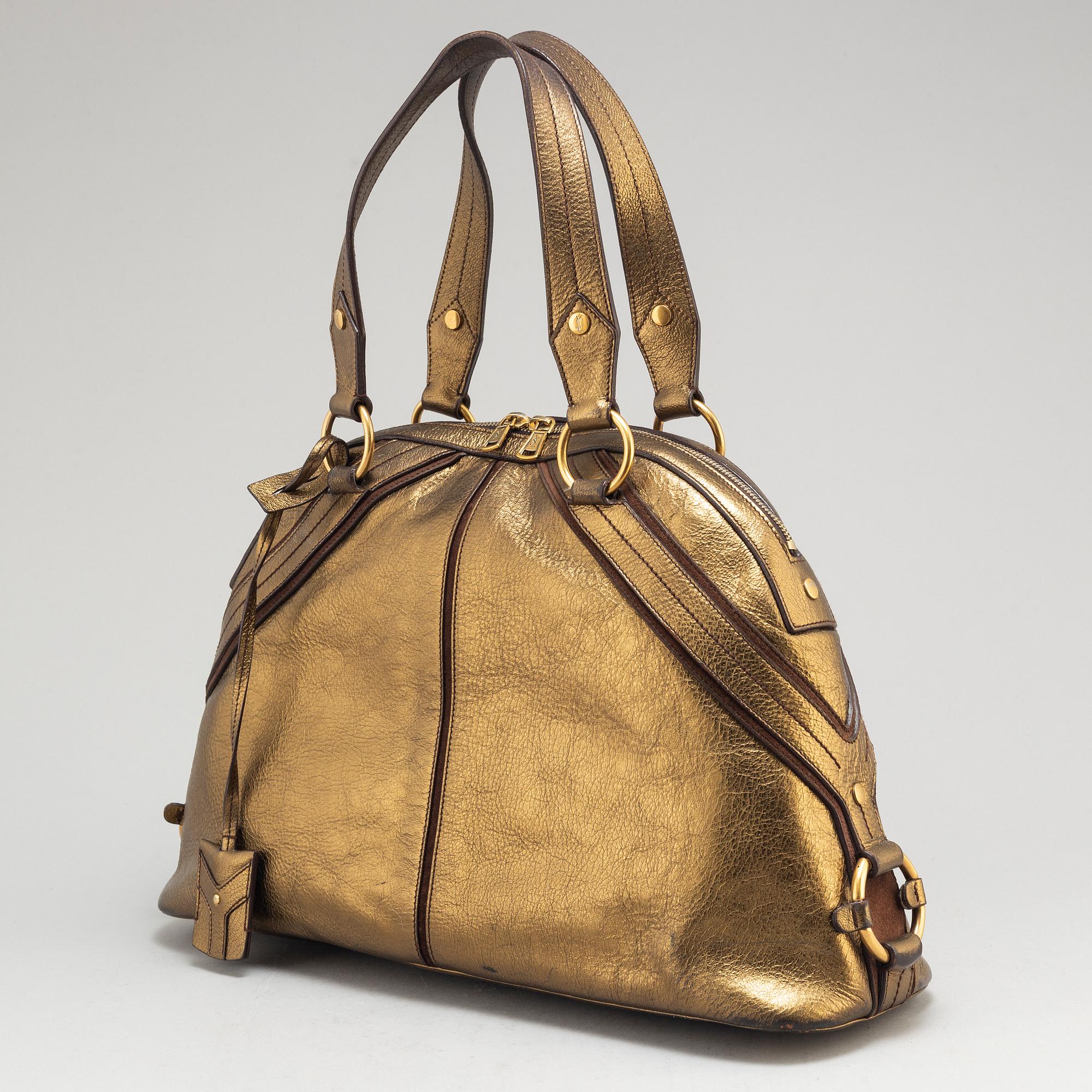 YVES SAINT LAURENT, a metallic bag.