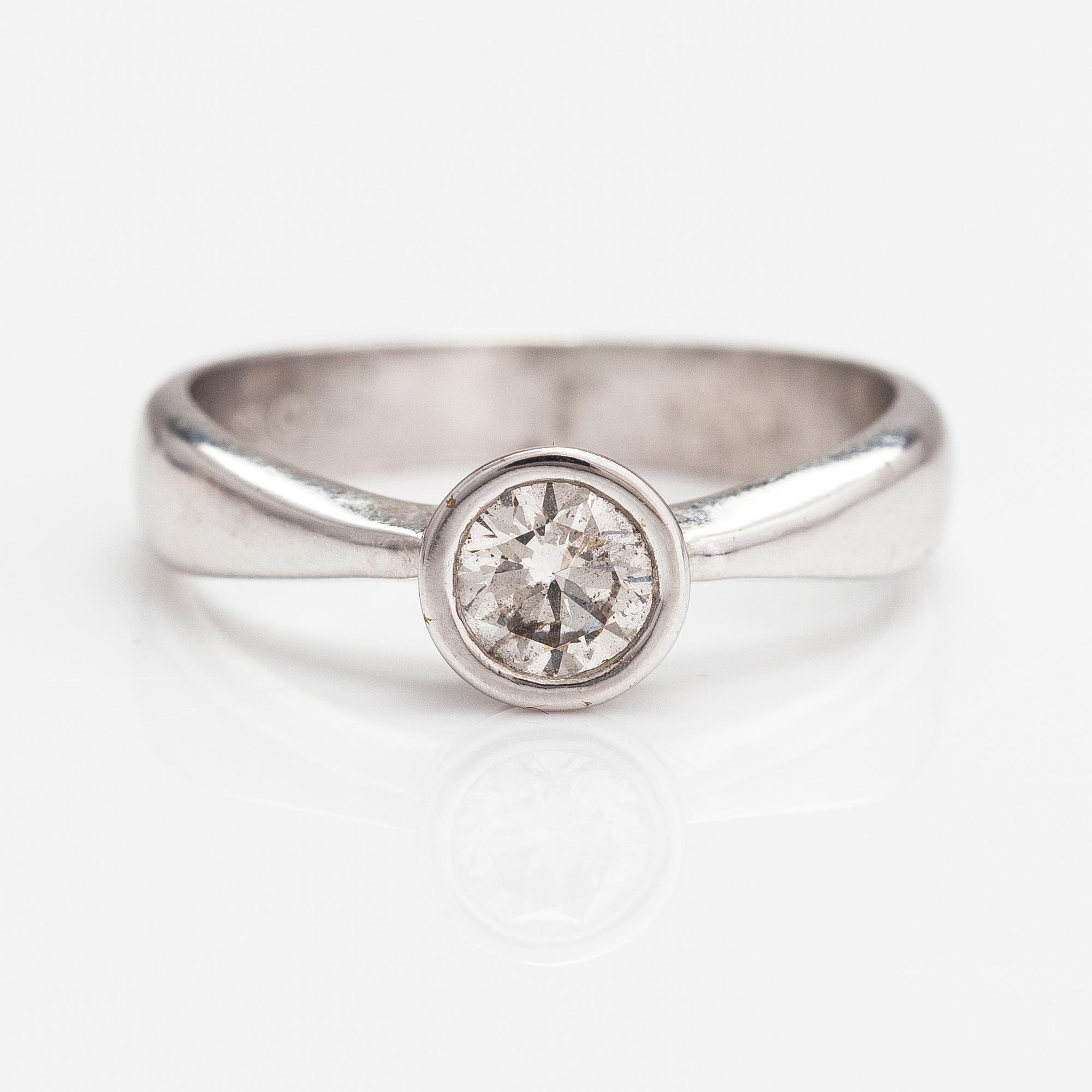A 14K white gold ring with a ca. 0.50 ct diamond according to engraving.